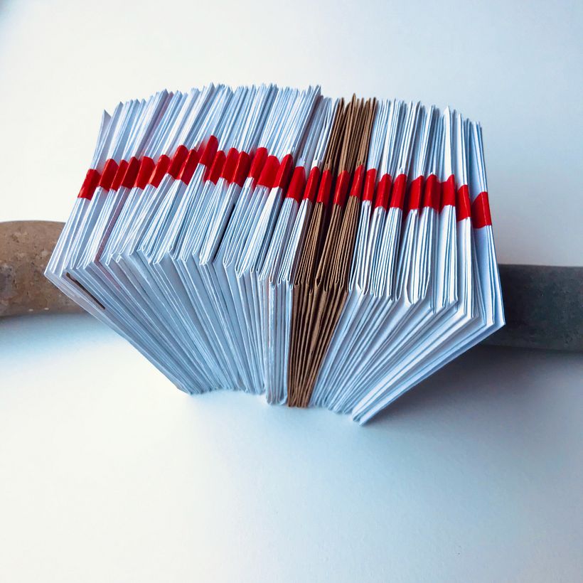 The red stickers reference traditional red wax seals used to seal locked letters.