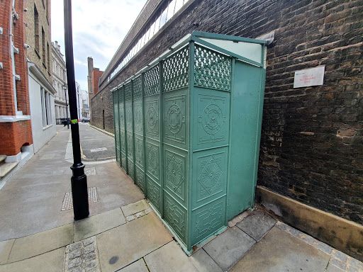 I became obsessed by wandering around London - here are some urinals in Star Lane. Copyright Julian White