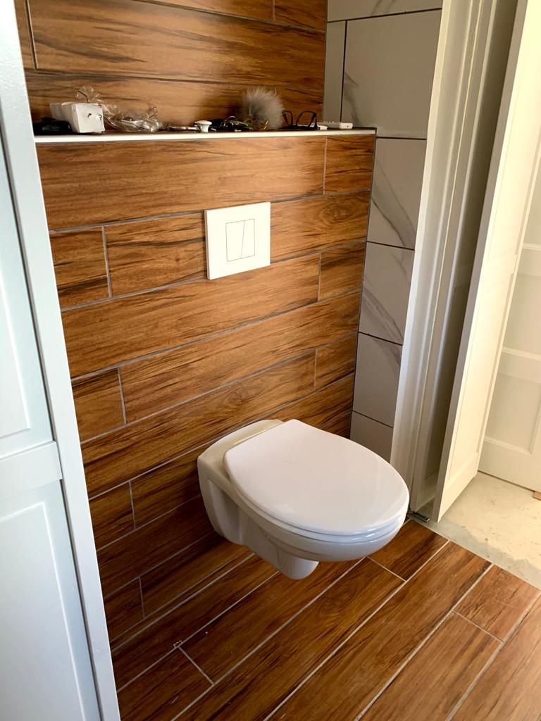 Really love the woods style tiles we use in the bathroom and how I choose to put it also on the floor. 