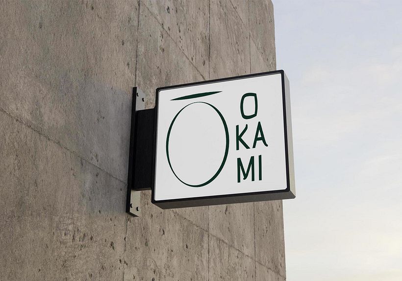 Segunda opción de logo OKAMI en la vía 