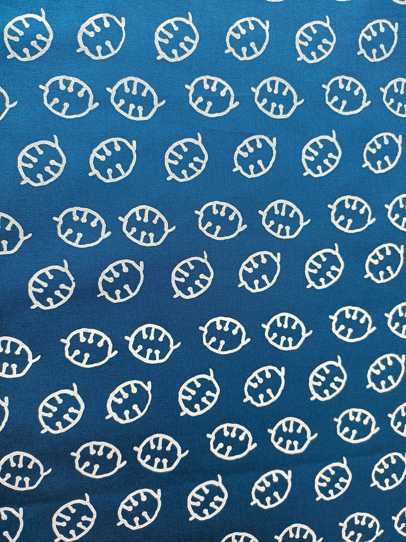 these are honesty seed pods - I am somewhat obsessed. White ink on blue linen.