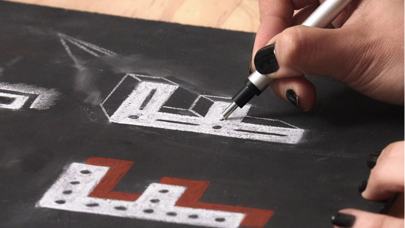 White chalk is the essential material you need when starting a lettering project.