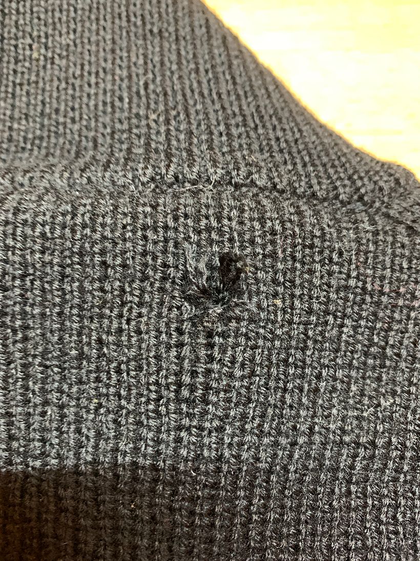 Hole at back of neck.