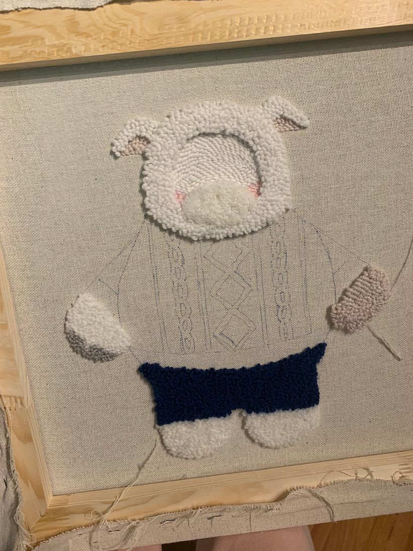 Baby Ada is Half lamb half human creature so it has a human hand - skin tone one and other is lamb paw