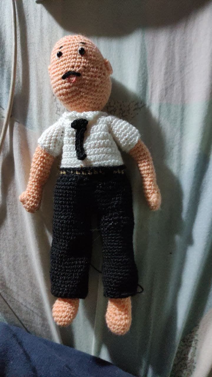 detalle de la ropita base camisa , corbata y pantalón