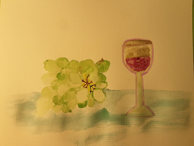 Uvas 🍇 y una copa de vino 🍷 tinto 