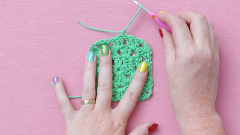 Pull the thread through the slip stitch to secure the granny square