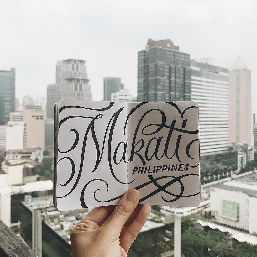 Use the names of the city and country you're in and letter them in two different styles.