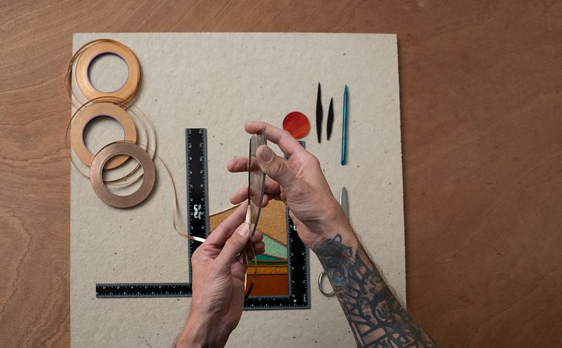 Copper foil attaches the glass together, links the solder, and frames each piece of glass.