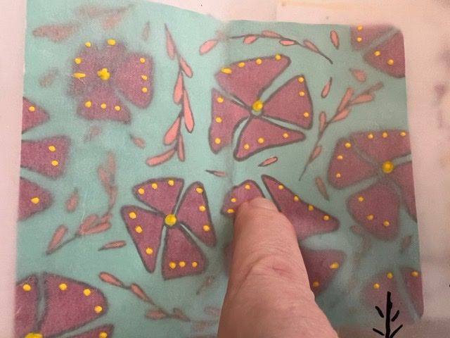 using transparent paper to find out if I going to like my addition and the chosen colour