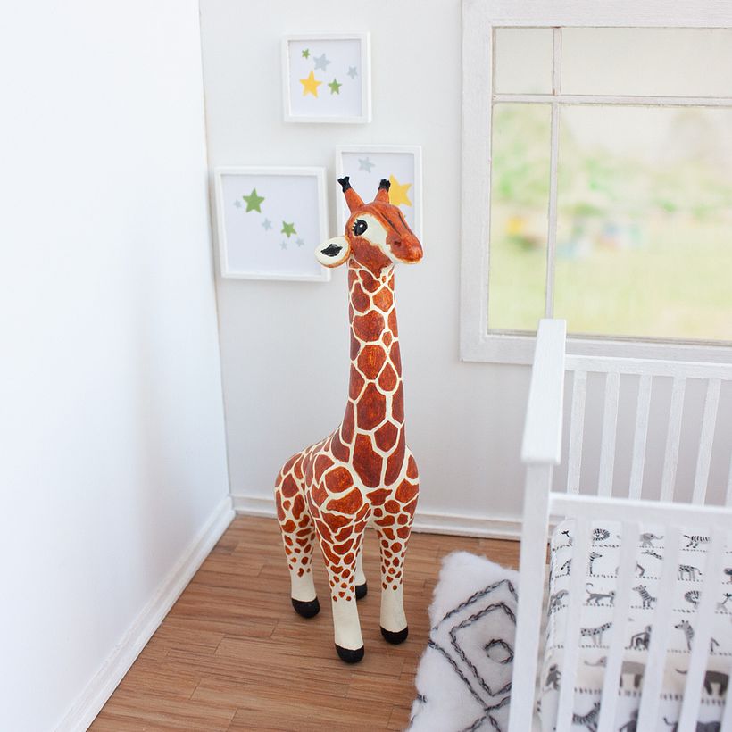 A mini giraffe I sculpted from polymer clay.