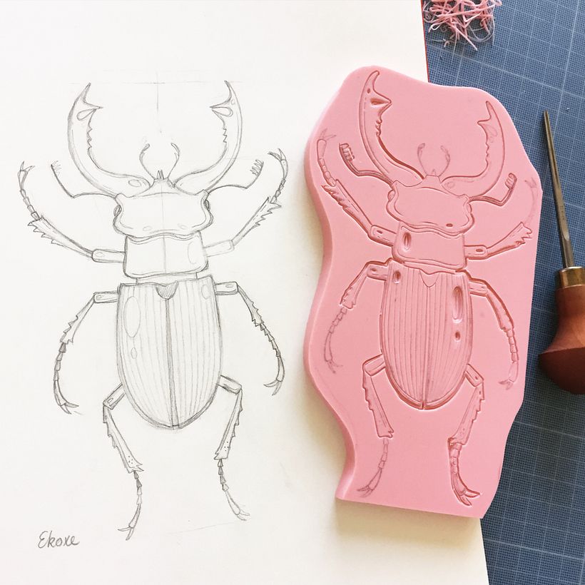 My initial sketch in my sketchbook and carving in progress.