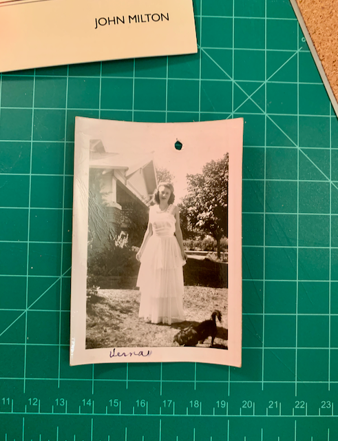 Verna, in a white dress