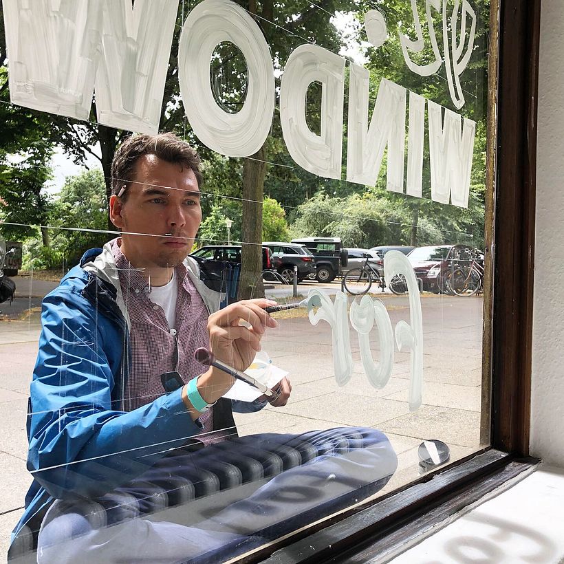 Me at work at the window of @allthingsletters 2019 / Hamburg