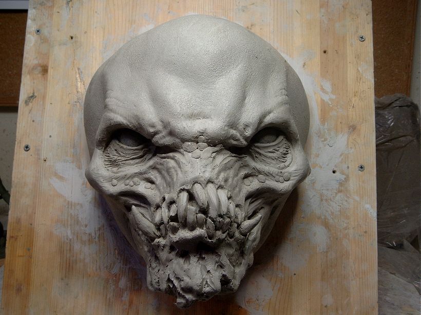 Here you can see a few angles of a mask sculpture in progress. This guy ended up being called "Alley Dweller"