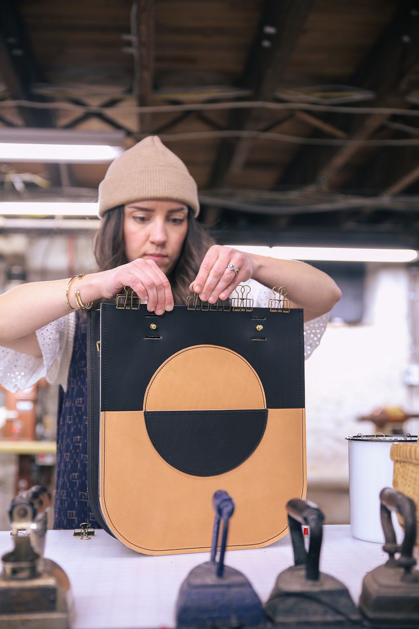 The bag is sewn, attaching the zipper top panel.