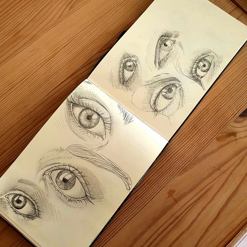 Eyes in open sketchbook