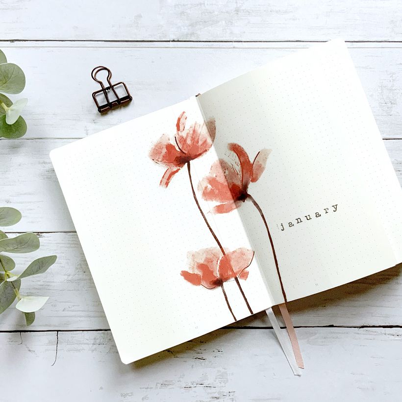 Image printed on transparent sticker paper in my bullet journal. Text hand-stamped.