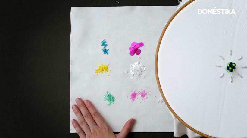 Putting all your beads and sequins on a piece of felt will help prevent them from sliding around as you work.