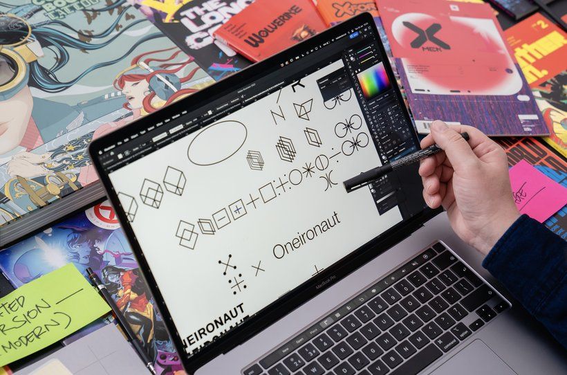 Once I'm happy with my sketches and concepts, I begin translating those into vectors in Adobe Illustrator and design the logo