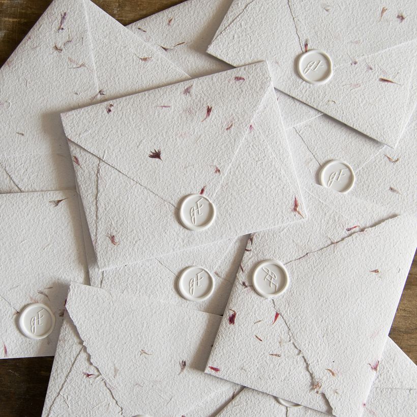 Handmade recyeled paper with cornflower petals.