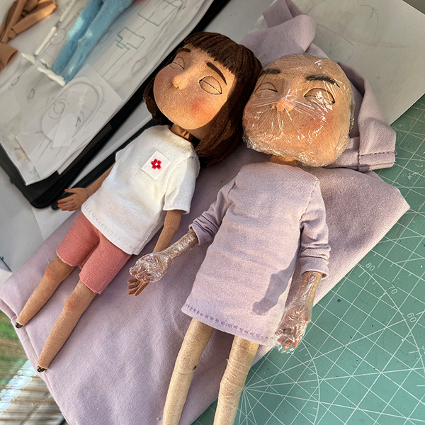 Fabric skin and felt hair.