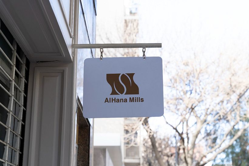 The idea of the logo is two shops next to each other, one of them grinds coffee and grains, and the other shop sells them 9