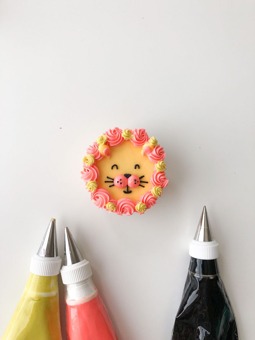 This smiley lion is ready to roar! The swirl mane is so clever and colorful. 