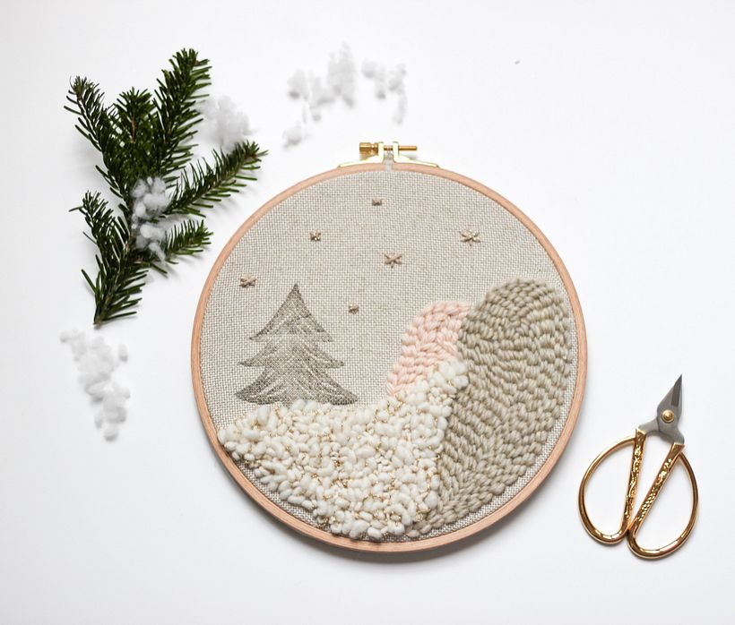 Otro tipo de paisaje invernal, con un abeto impreso. 