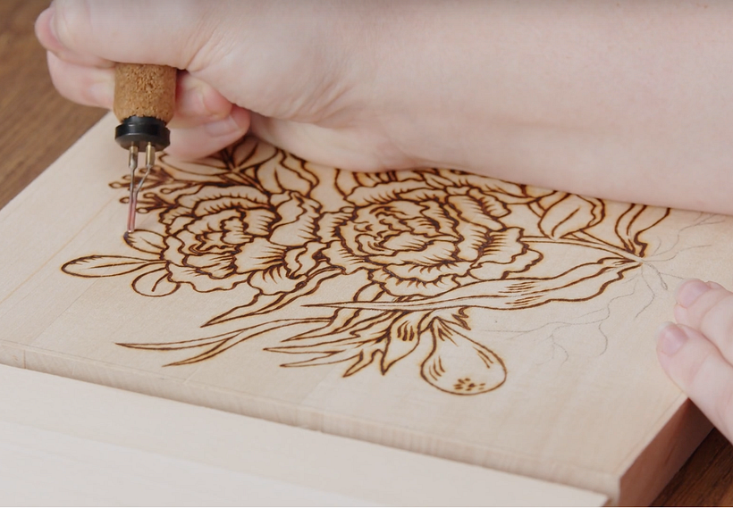 Then we start burning! Start with the linework, then move in to finer details.