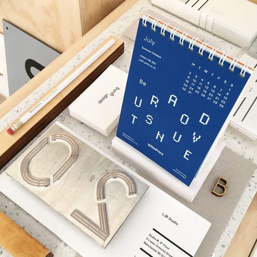 July calendar design with white digital ink and clear hot foil stamping design by Laura Jane Boast