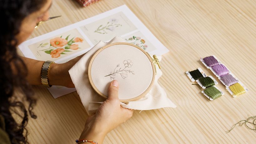 Embroider the stem and leaves using a medium shade of green, 3 Strand thread.