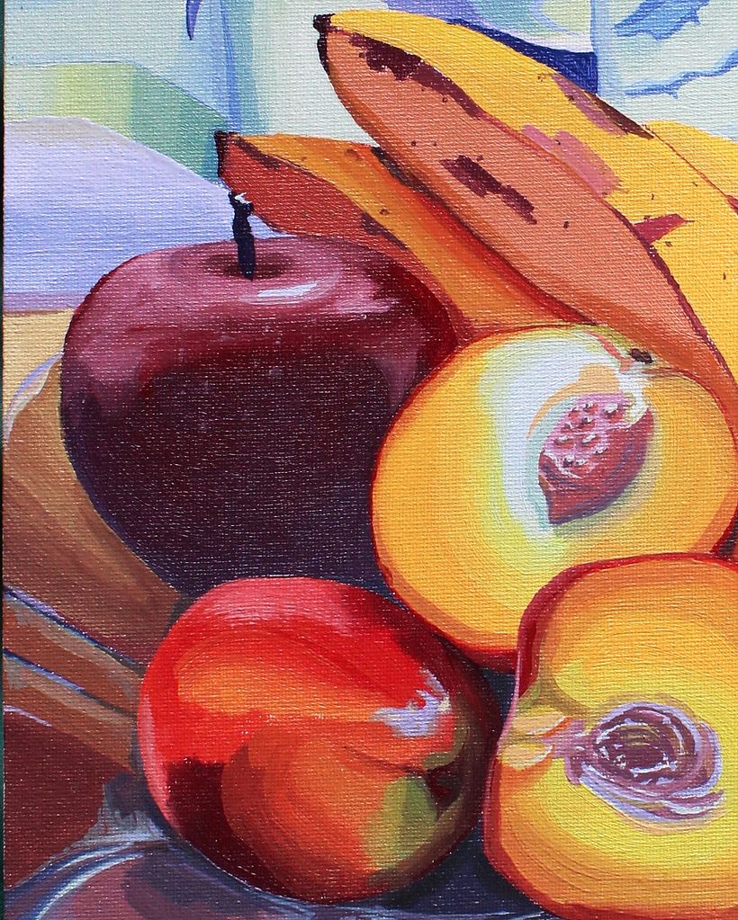 Detalle de duraznos y manzanas.