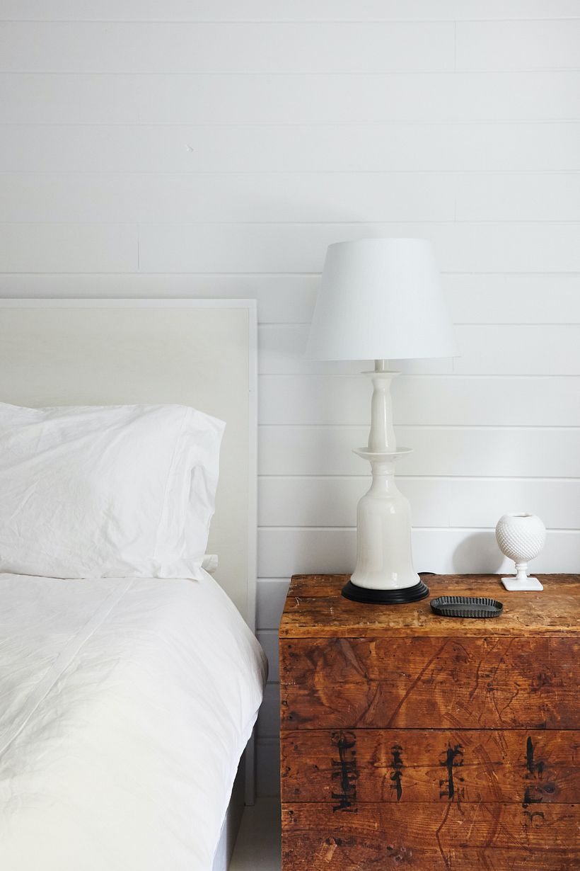 Simple white on white for calm in another bedroom.
