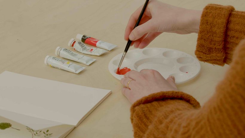 Add a small about of water to your gouache pigment and mix thoroughly until you achieve a smooth consistency.