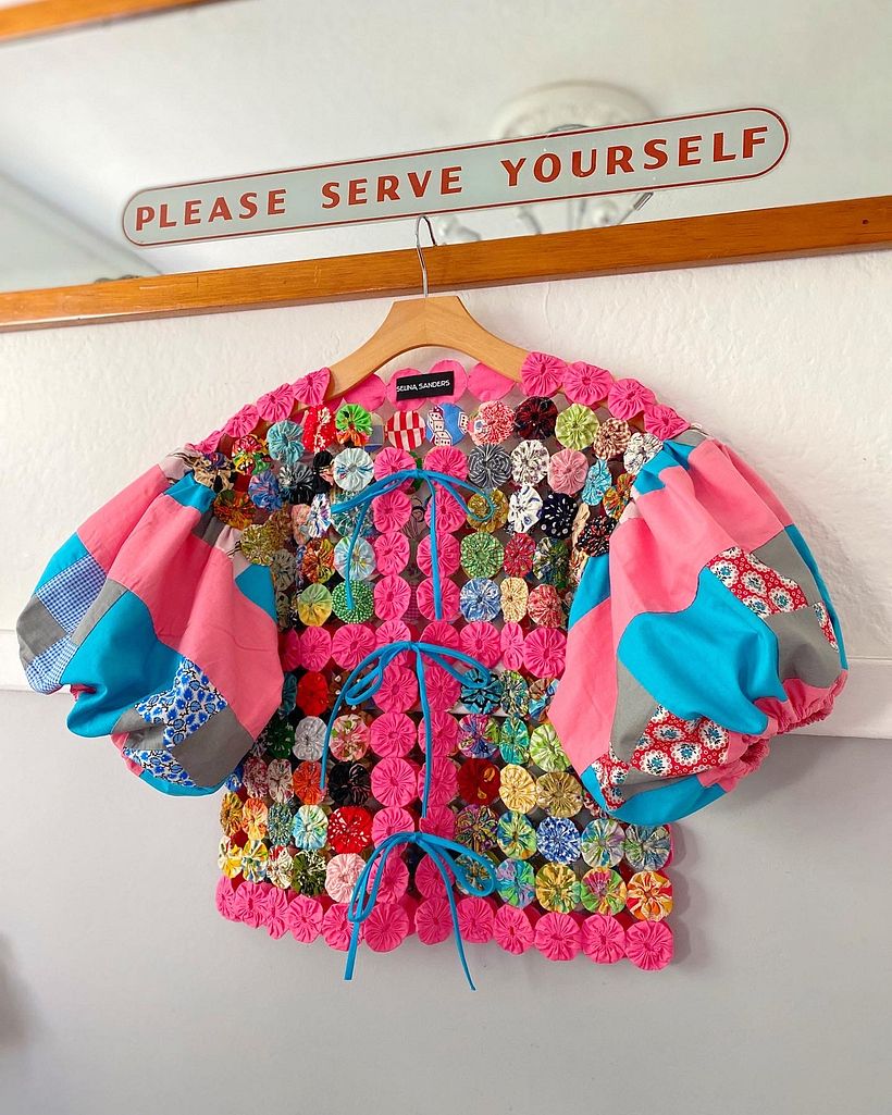 Jacket is Upcycled from a vintage Yoyo blanket and quilt sleeves