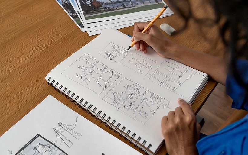 Mokshini tests out compositions with loose sketches.