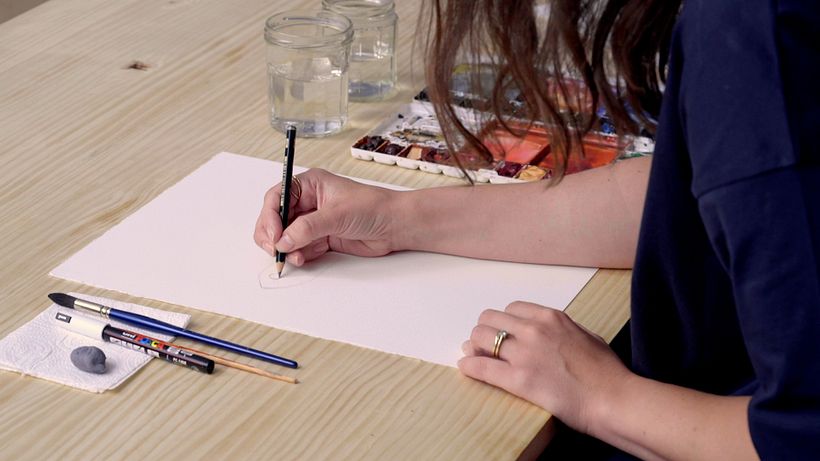 Sketch out the shape of the fish before applying paint. 