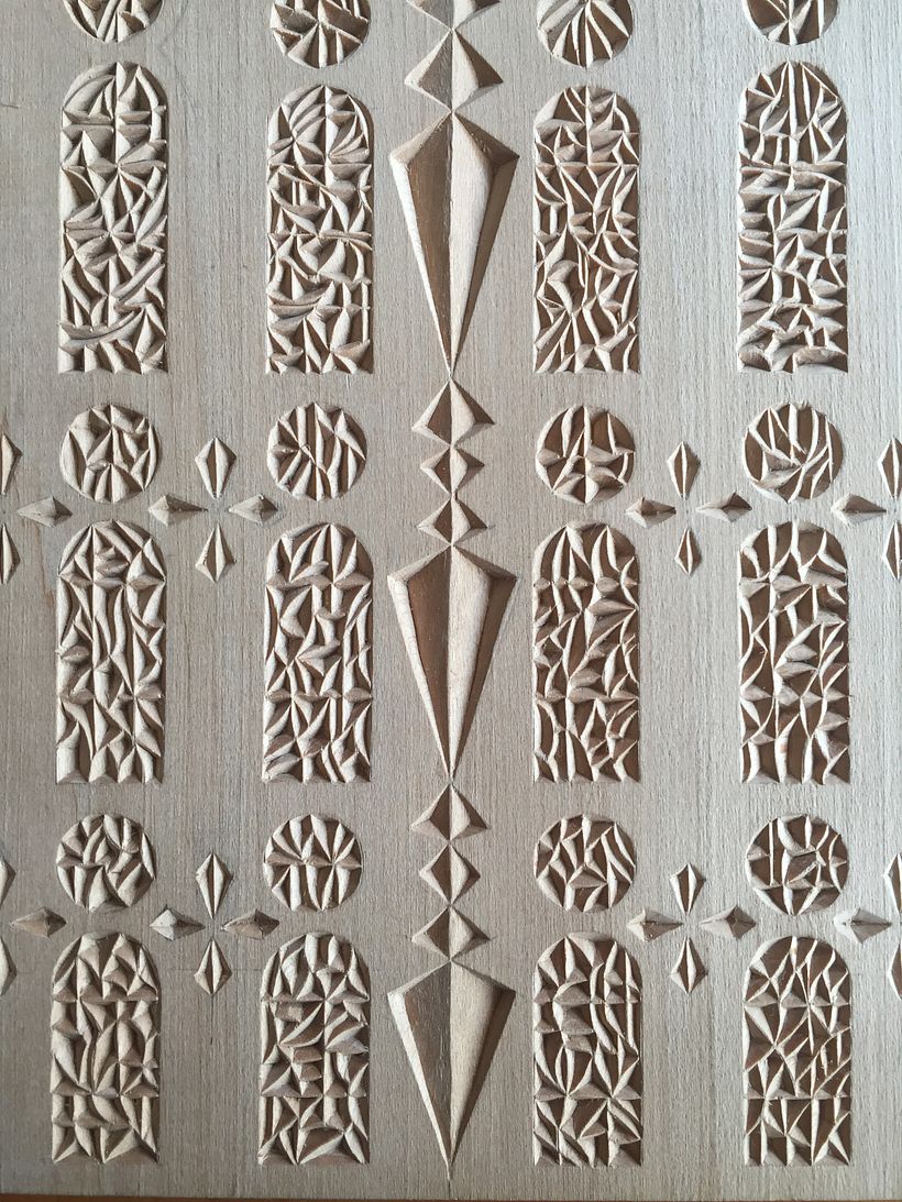 Stone carvings done in between windows.