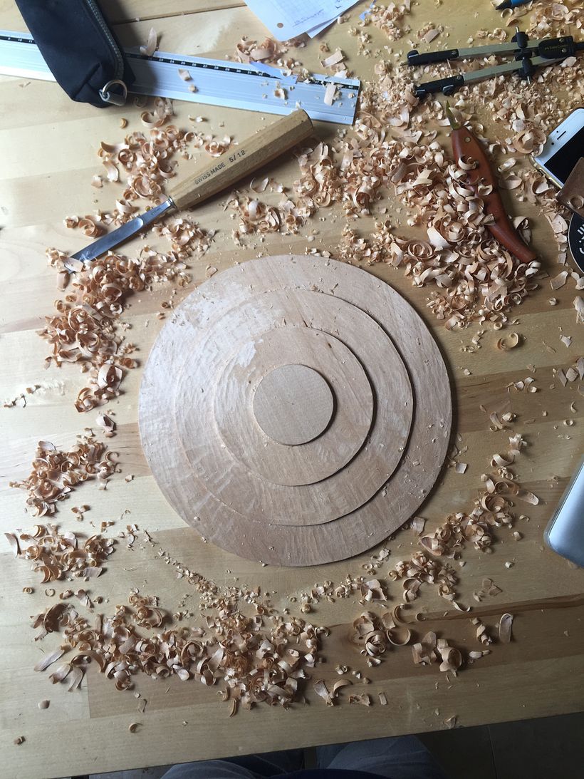 Relief carving process. Used gouges for this part of the carving.