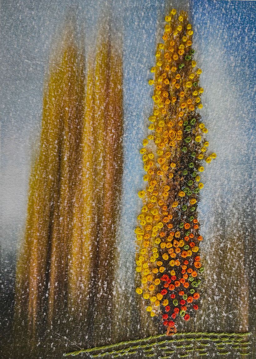 The tree was embroiderd with French Knots using 3 strand DMC and 4 and 2 strands for the green backstitch.