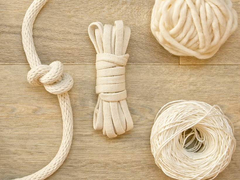 Left to right: braided rope, knit rope, felted yarn, floss.