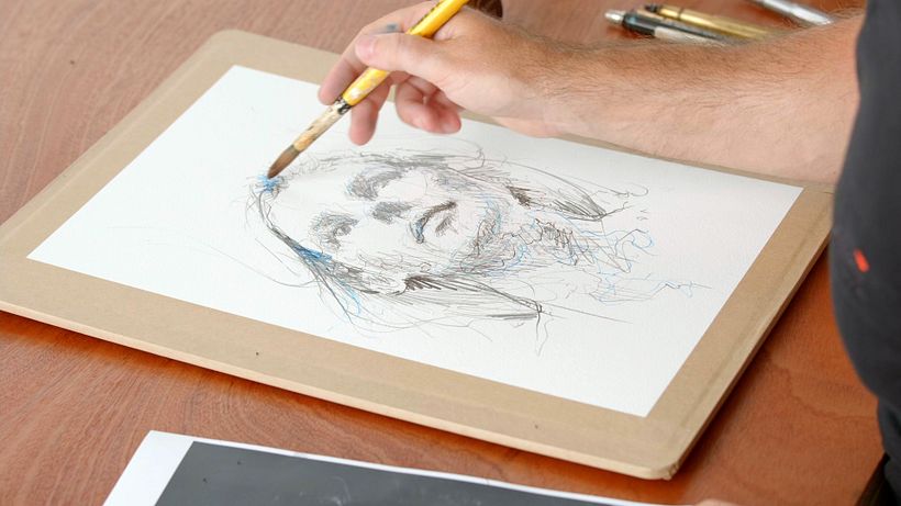 Add water to the ink marks.