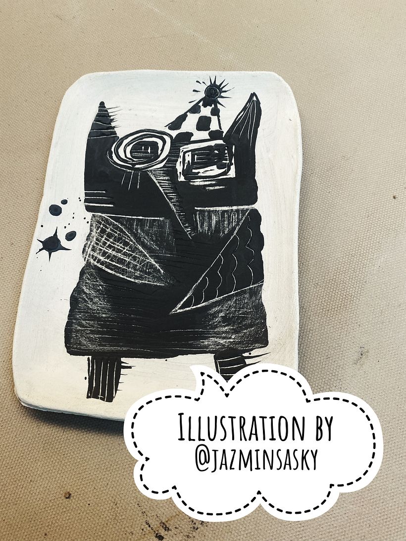 Illustrated ceramic plate made with the technique learned in this course!