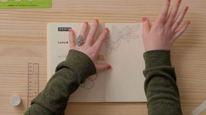 Use a combination of white-out tape and stickers.