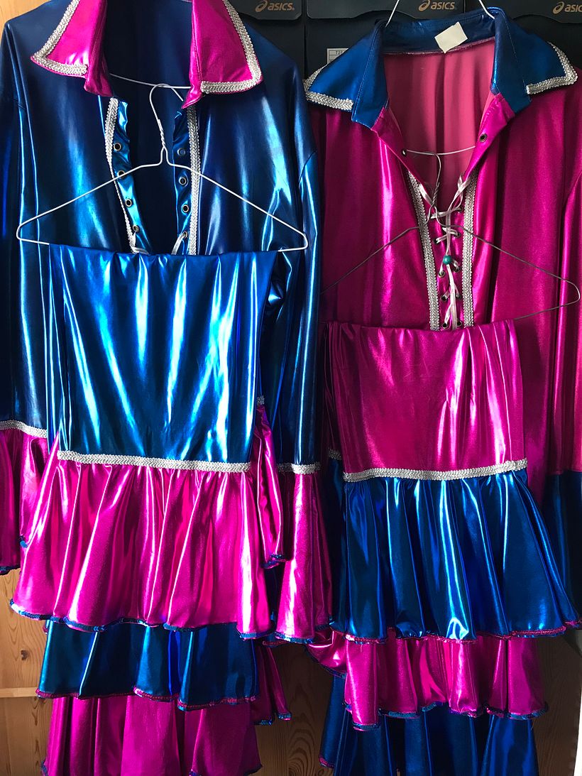 The singing is important, and the costume helps set the scene :-)