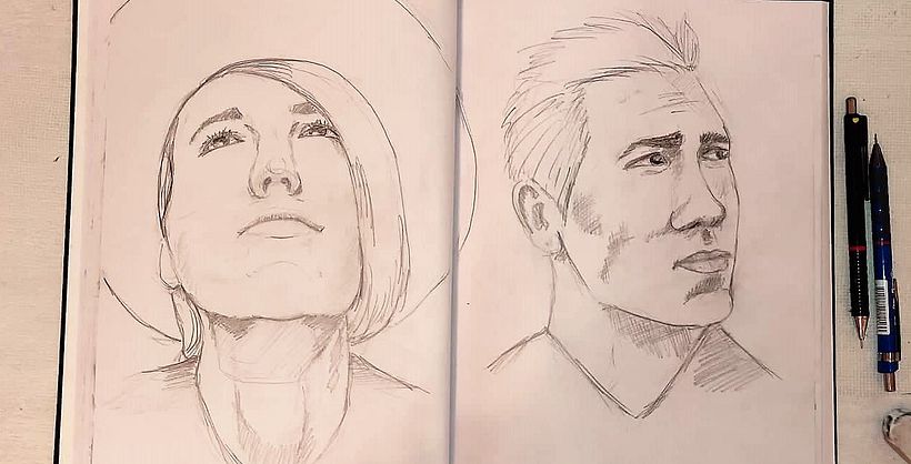 Two additional portraits, one looking up and one three quarters.