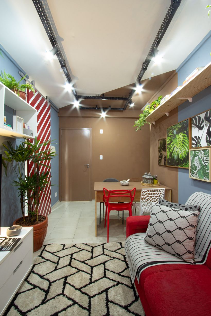 Sala de estar e jantar. Um palco para o shows do trio que mora nela. São Paulo/SP 13