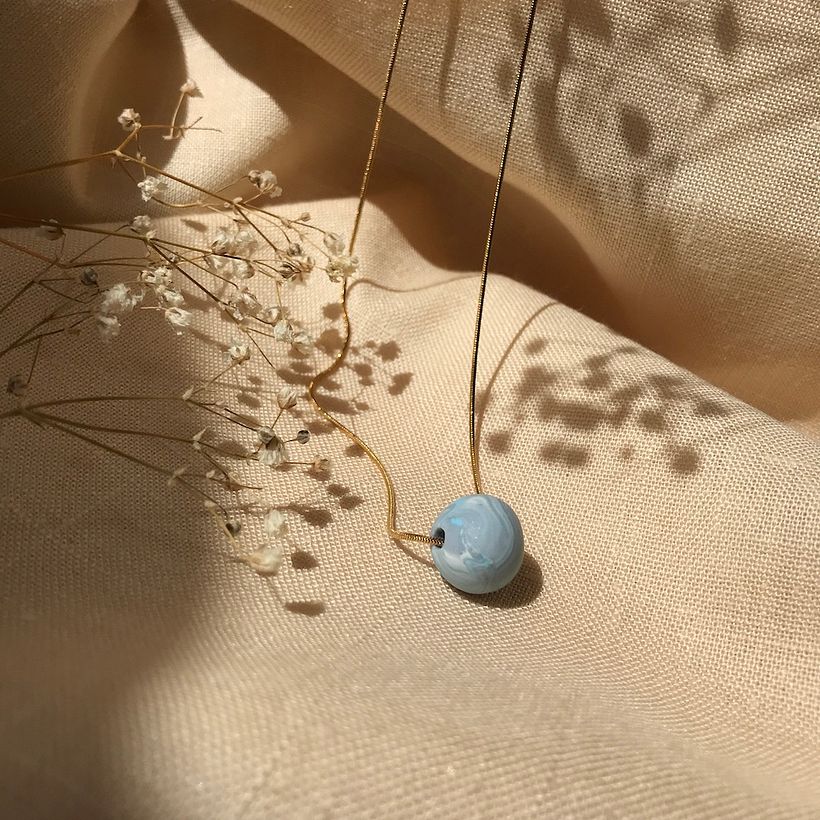 Jewelry by Monica Ferreira.