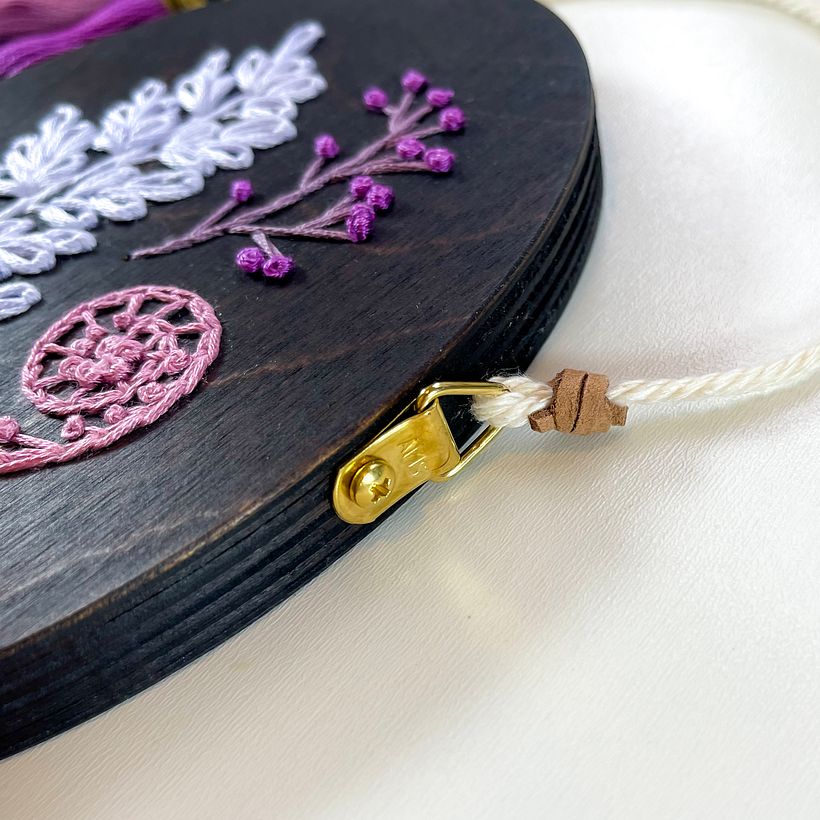 Detail of hardware and cotton rope.